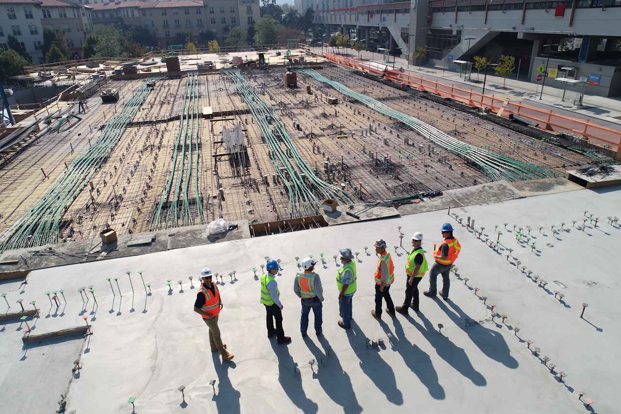 A construction team working together on a building frame